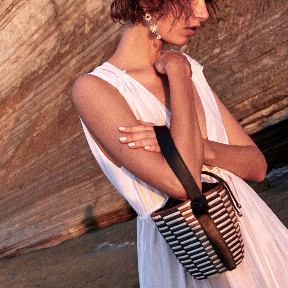 Cesta Collective Handwoven checkered bucket bag with leather handle